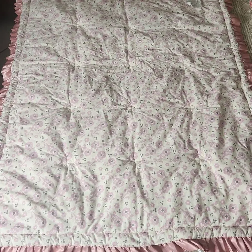 The Peanutshell bella pink patchwork baby quilt